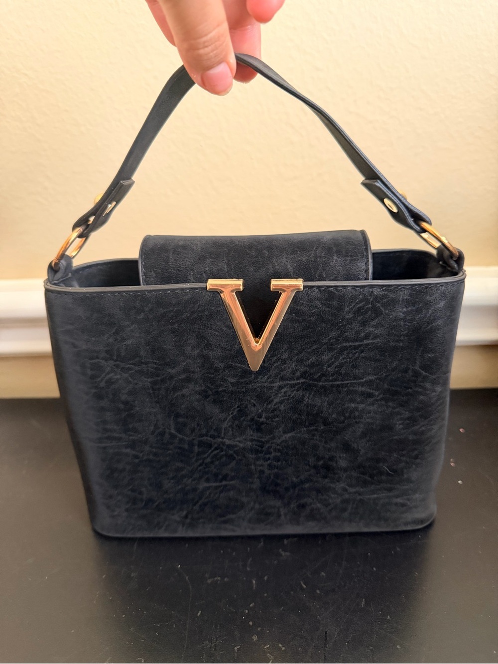 Structured Black Top-Handle Bag with Gold V Accent